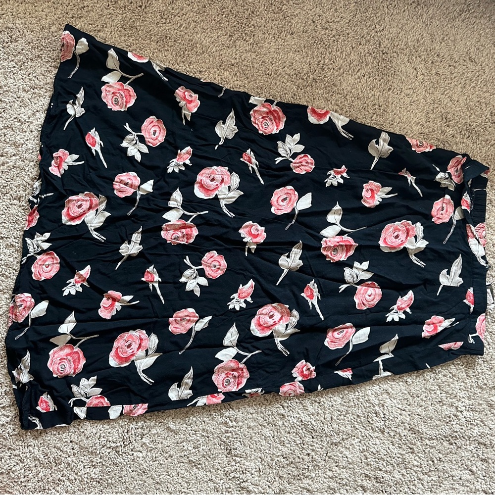 Black skirts with pink floral designs